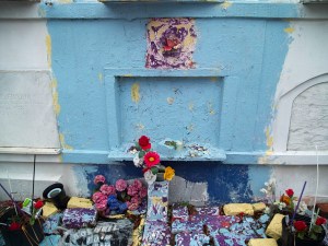 A member of this family still regularly hand-paints this tomb to honor his grandparents. *